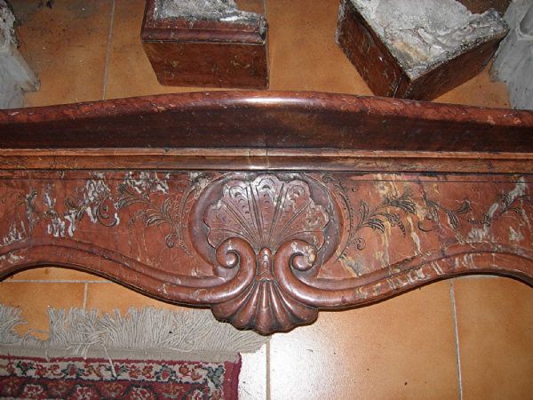 red veined marble fireplace