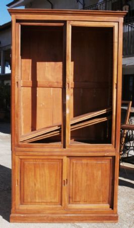 Antique walnut bookcase with two doors