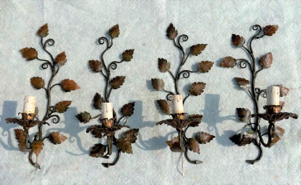 Four metal sconces