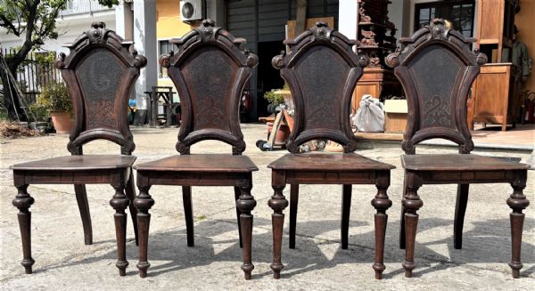 Four walnut chairs