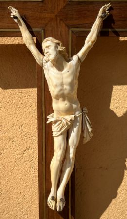 Ivory Christ on a walnut cross