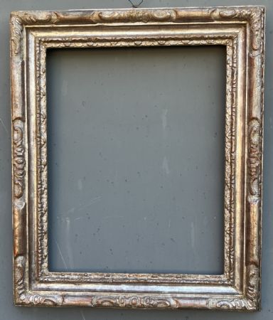 cornice in legno scolpito e argentato