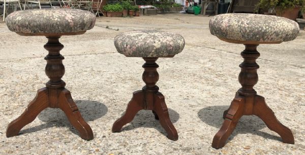 Group of three walnut stools