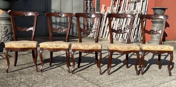 Group of five walnut chairs