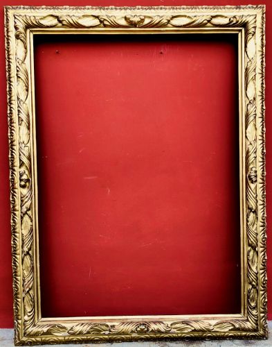 Large carved and gilded wooden frame