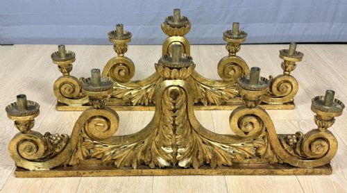 Rare Pair of five-arm carved and gilded wooden candelabras, full 18th century.