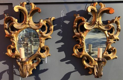 pair of Tuscan appliques
    