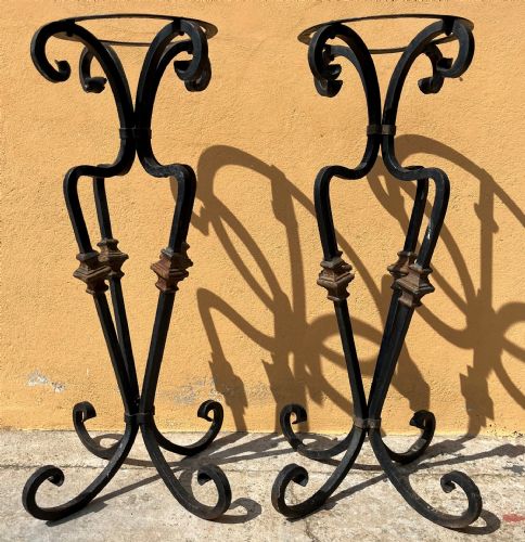 pair of wrought iron floor lamps
    