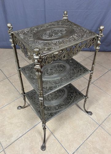 Musterschutz branded silver cast iron coffee table
    