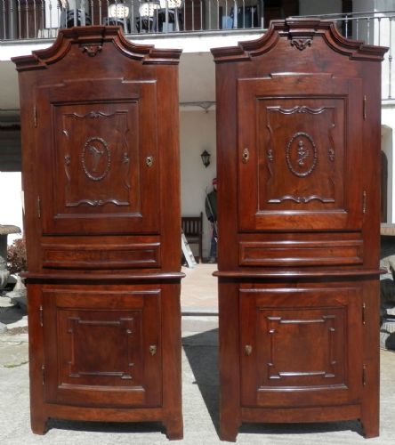 pair of corner cupboards