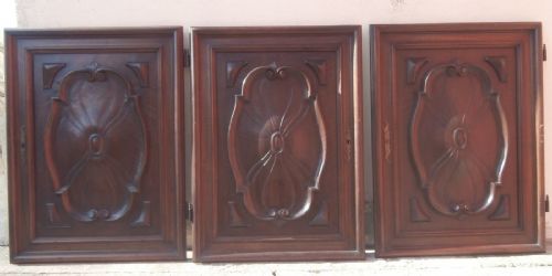 three carved doors
    
