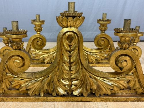 Rare Pair of five-arm carved and gilded wooden candelabras, full 18th century.