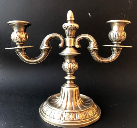 pair of silver candlesticks
    