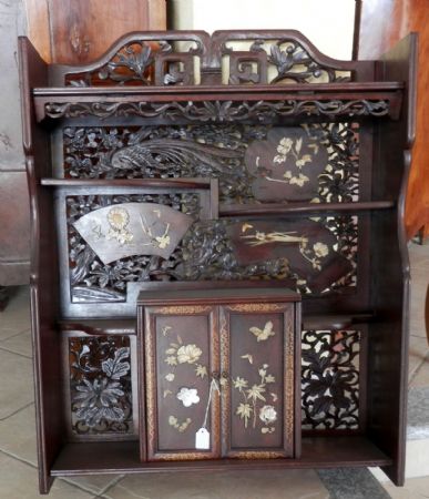 cabinet with shelves and figures