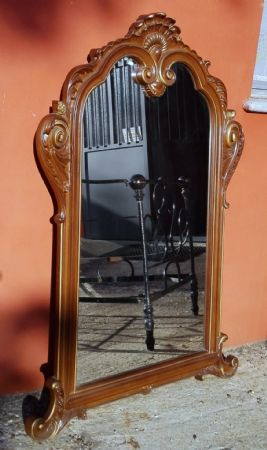 large lacquered and golden mirror
    
