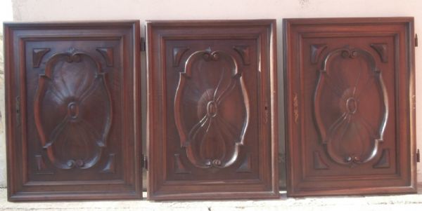 three carved doors
    